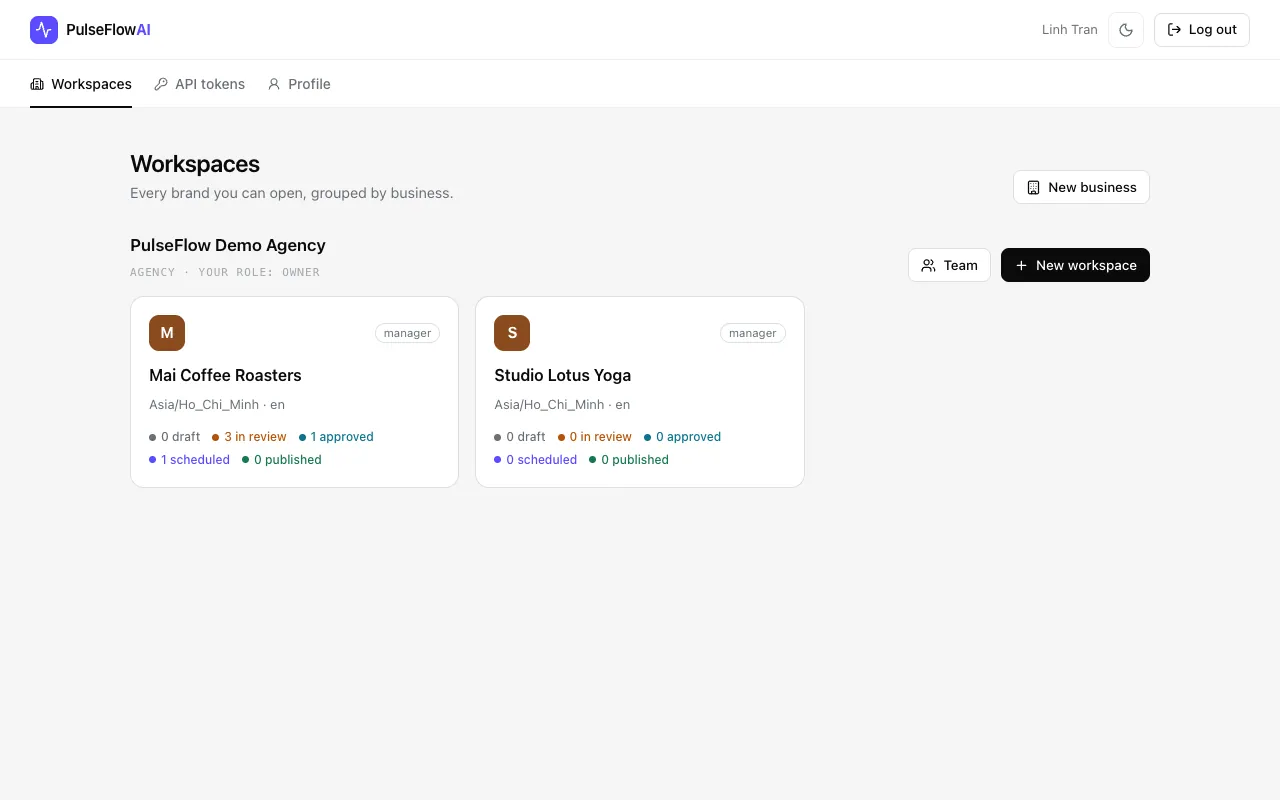 The Workspaces page with two brand cards showing role and post counts per status